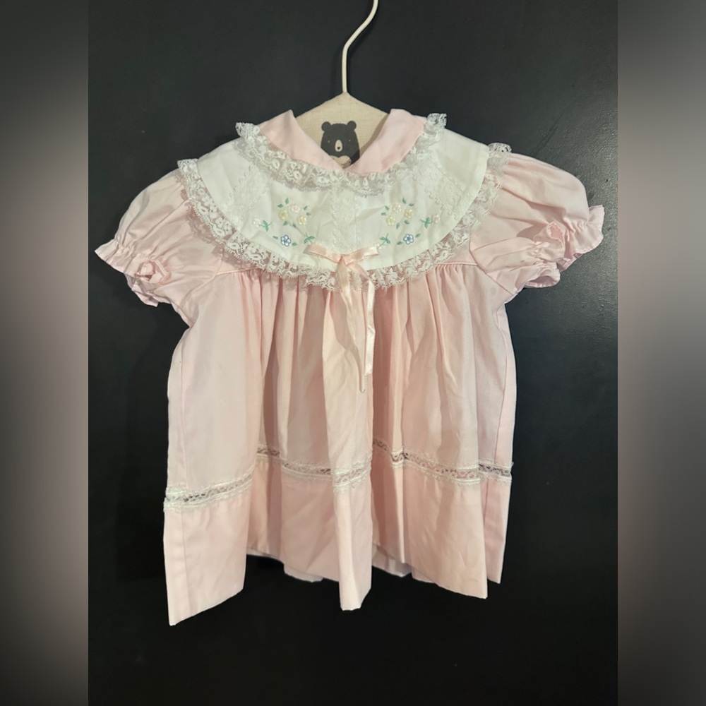 12m pink & white dress made by Baby Jogs. Lace & embroidery around the neck.